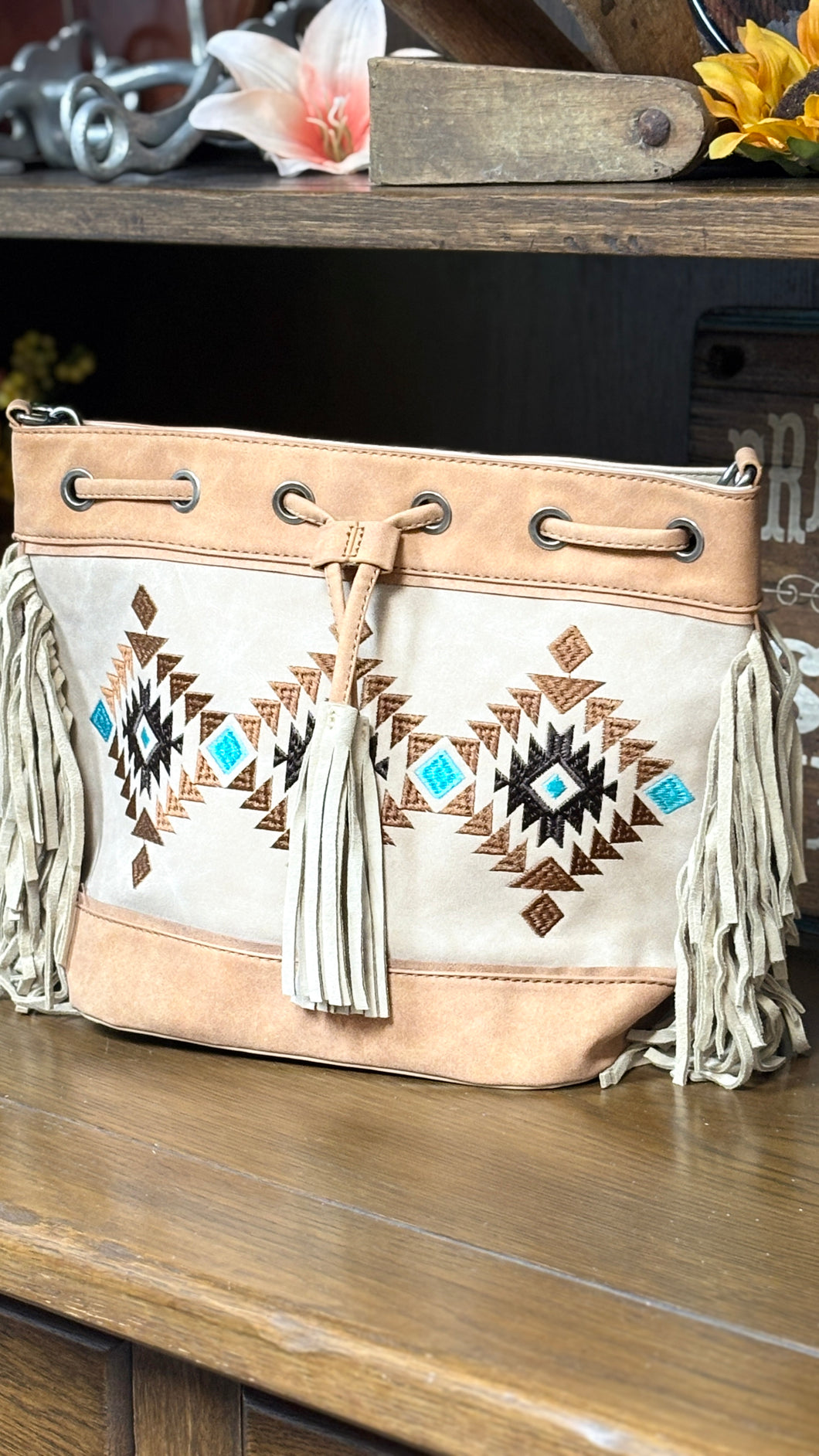 MW Embroidered Drawstring Shoulder Bag